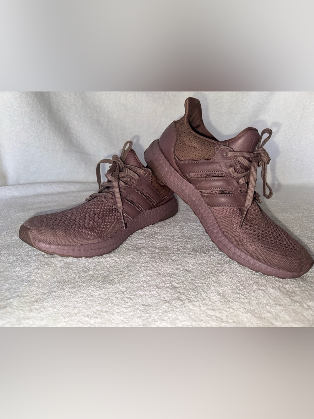 Adidas Ultraboost 1.0 running shoes in the "Wonder Oxide" purple color